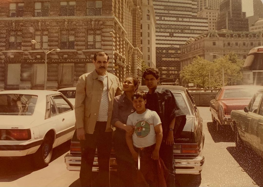 Emily Reyes' family: Abuelo Emigdio, Abuela Valentina, Papá Eric, and Tío Kenny. Financial District, Manhattan, NY, late 1970s-early 1980s. Courtesy of the Reyes Personal Family Archives